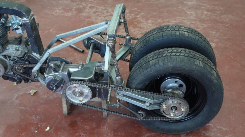 Custom rear tilting suspension system on a handmade tilting trike motorcycle
